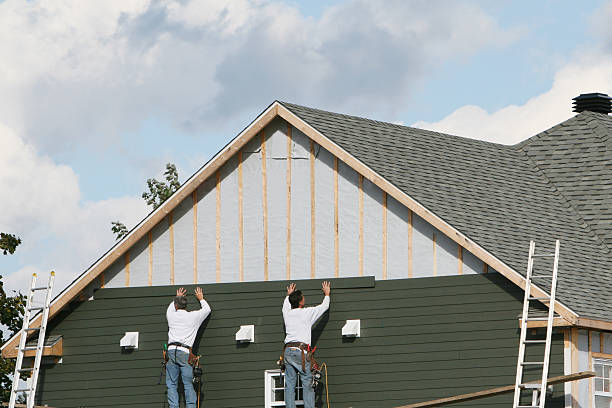 Professional Siding technician working in Rougemont, NC